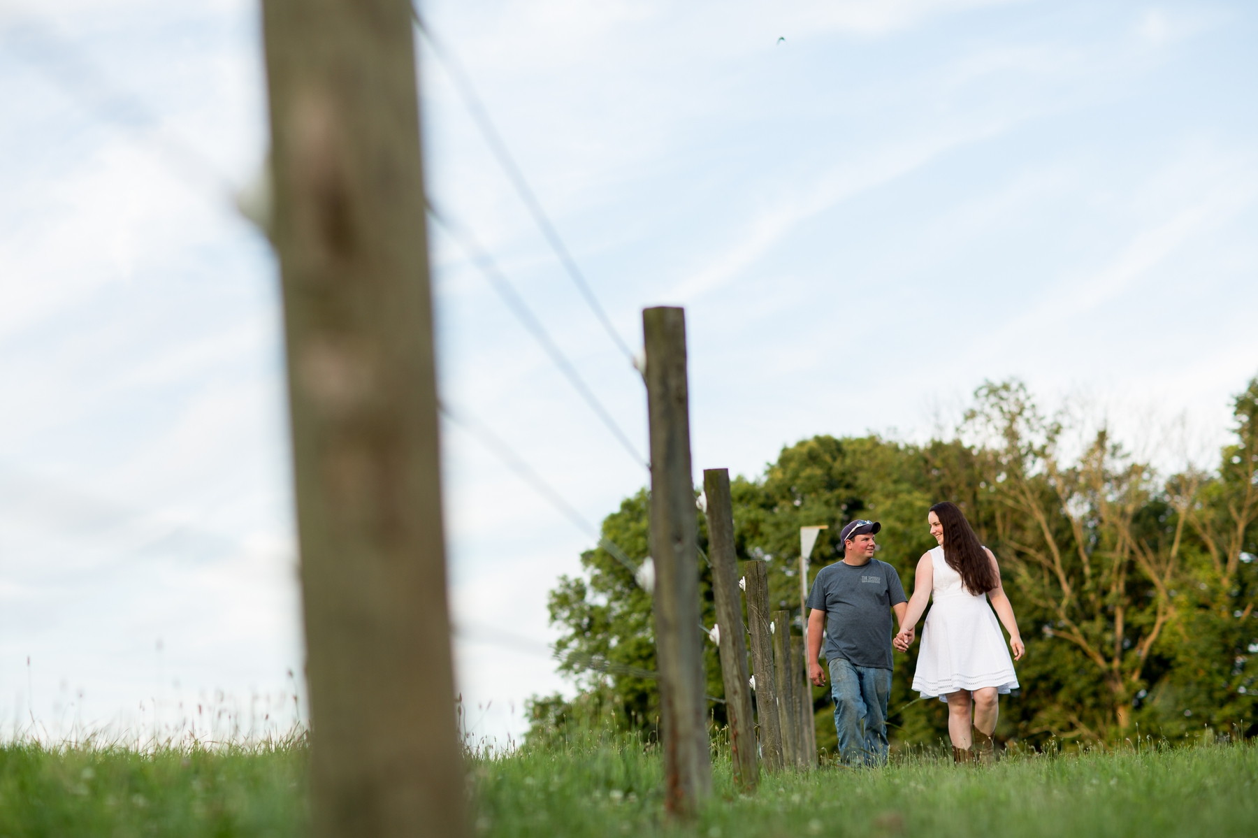 fun engagement photos at a horse farm